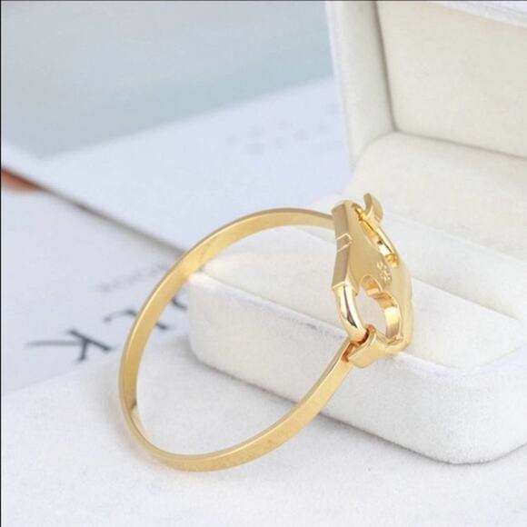 Tory Burch Gold Gemini Petite Hinge Bangle Bracelet - Picture 3 of 8